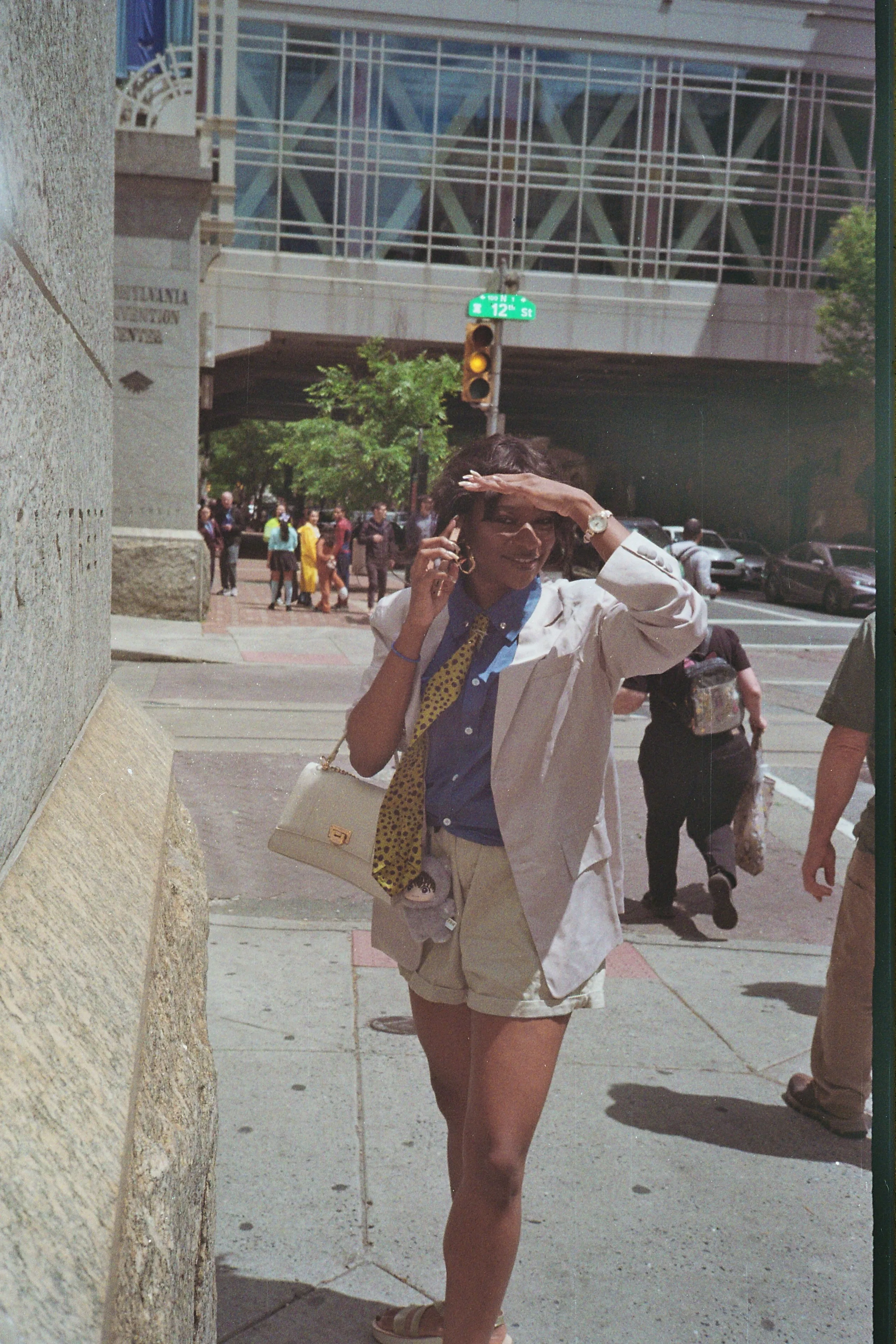 Ruth Koleva walking outdoors in the city